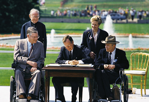 President George H.W. Bush signs the ADA